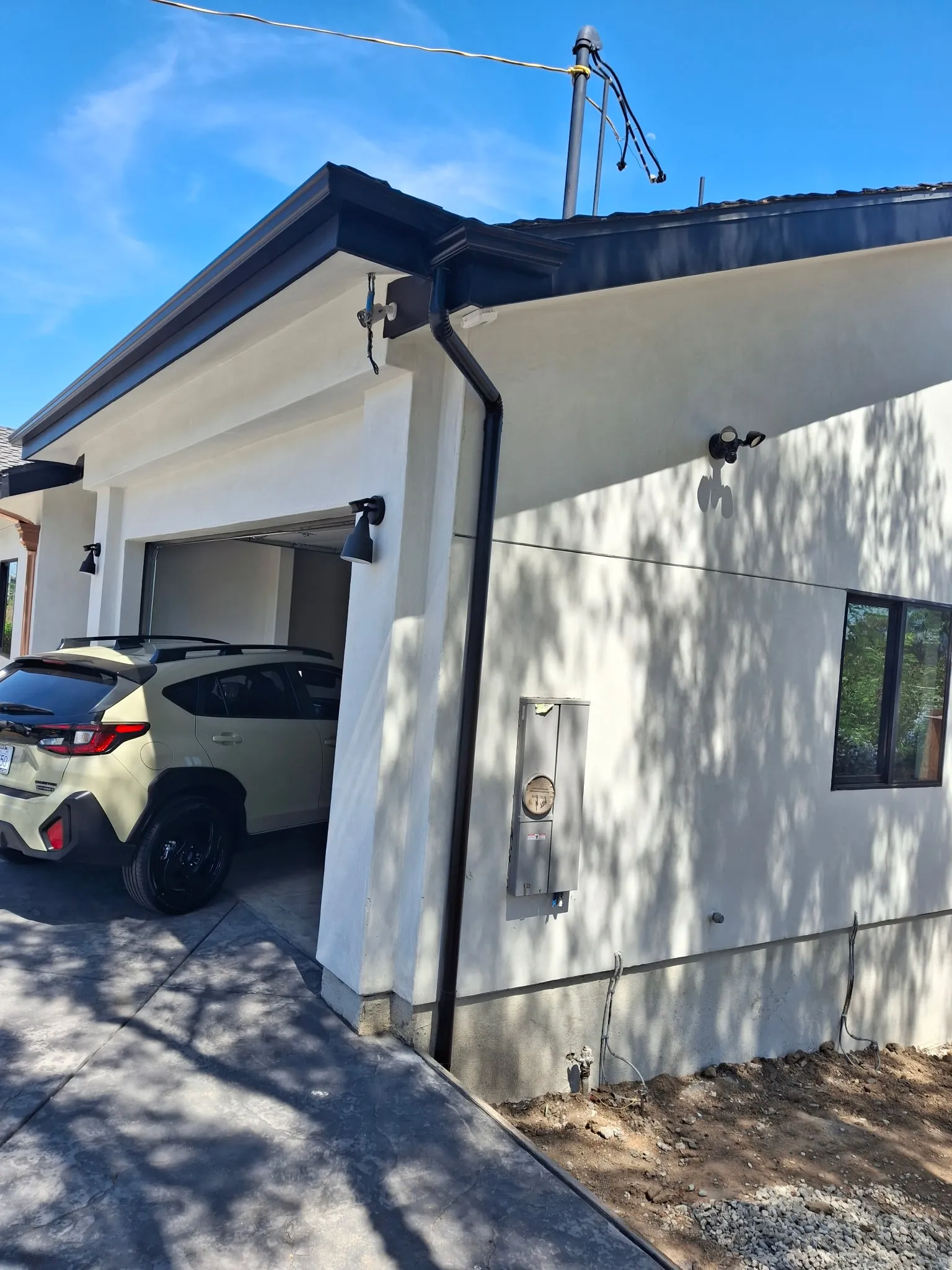 Modern black gutter system in Beverly Hills, CA