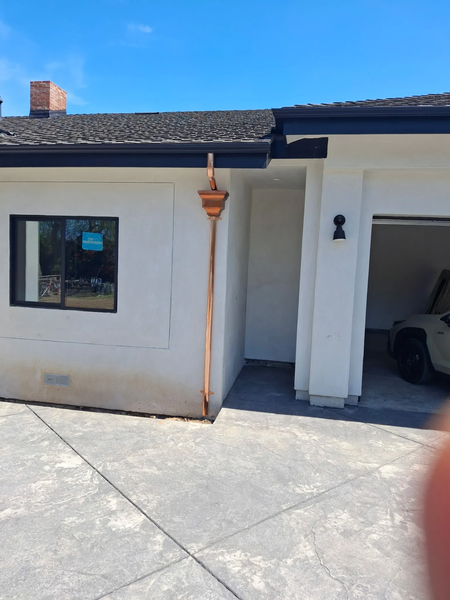 Copper leader head and downspout in Pasadena, CA