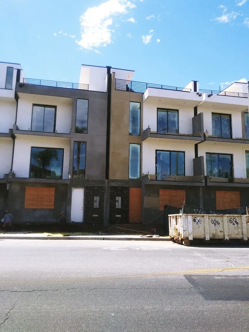 Multifamily exterior metal and drainage details in Southern California